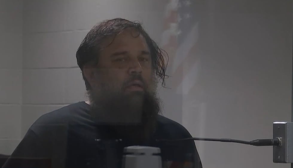 A man shot a landscaper in the head with a crossbow because he was angry his car had been...