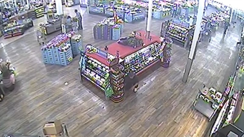Surveillance video from inside a Smith's store in Las Vegas shows customers and employees...