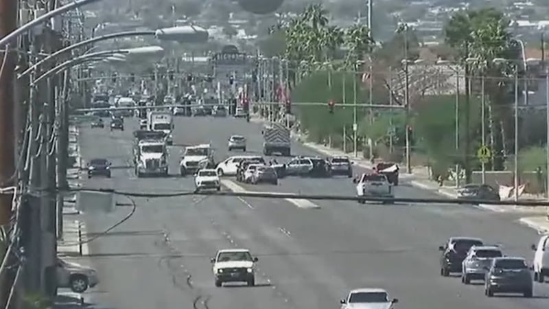 Two LVMPD officers and another person were hospitalized after a two-vehicle crash Wednesday...