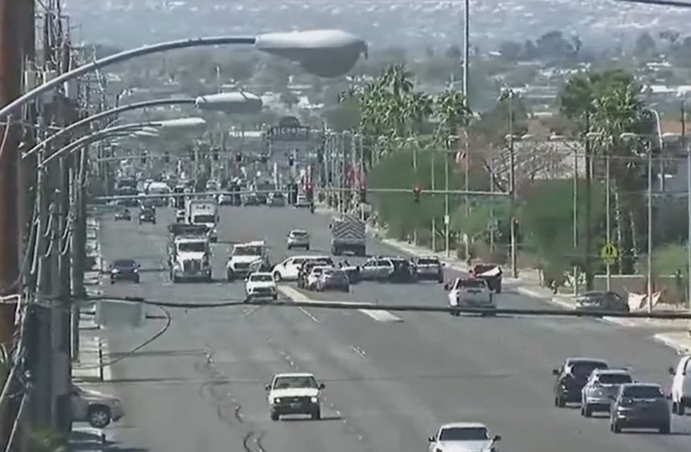 Two LVMPD officers and another person were hospitalized after a two-vehicle crash Wednesday...