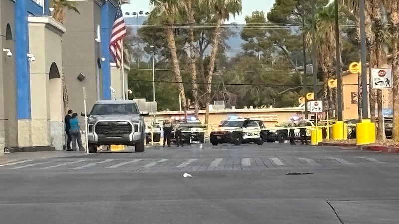Las Vegas police are investigating an officer-involved shooting that came after a fight in a...