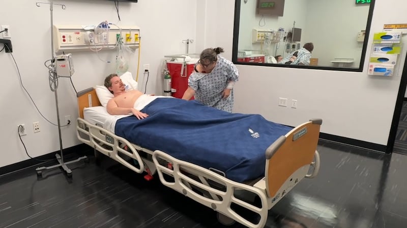 Joshua Hughes and Ann Kirkham acting as medical patients at Touro University in Nevada