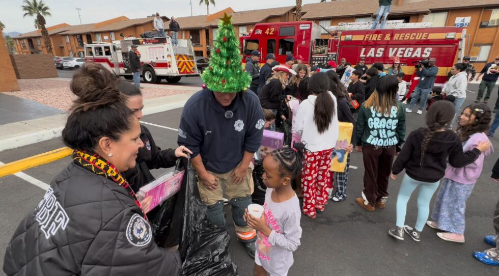 Firefighters traded their usual emergency calls for holiday deliveries Monday as the...