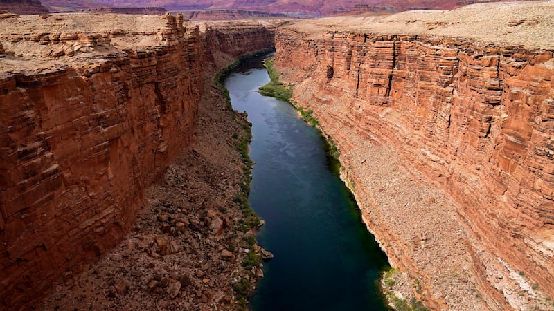 FILE - The Colorado River in the upper River Basin is seen, May 29, 2021, in Lees Ferry, Ariz....