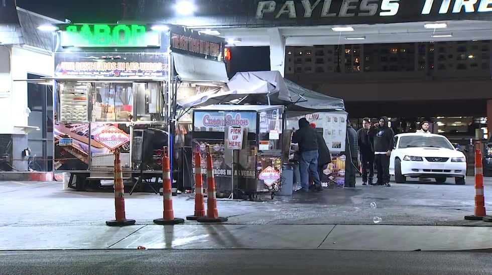 Two people were taken to the hospital after a car crashed into a taco stand in downtown Las...
