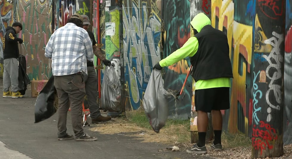 Volunteers clean up trash in the Arts District