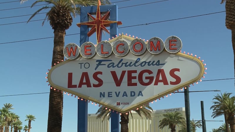 The Welcome to Las Vegas sign glows pink to celebrate the grand opening of the Museum of Ice...