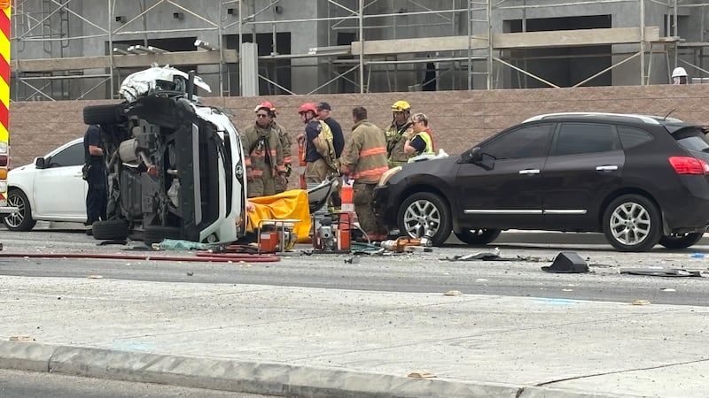 Two people were hospitalized Thursday following a two-vehicle rollover crash near Pebble Road...