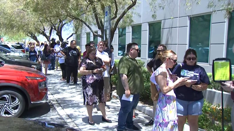 NV Energy customers wait in triple-digit heat for public hearing