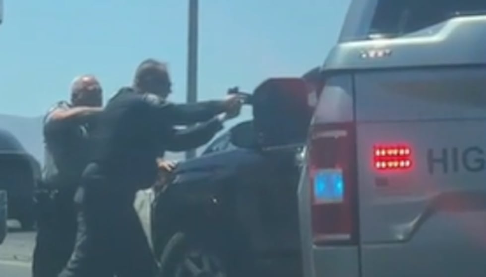 Viewer video FOX5 received of a reported trooper shooting near Las Vegas Boulevard on I-11 on...