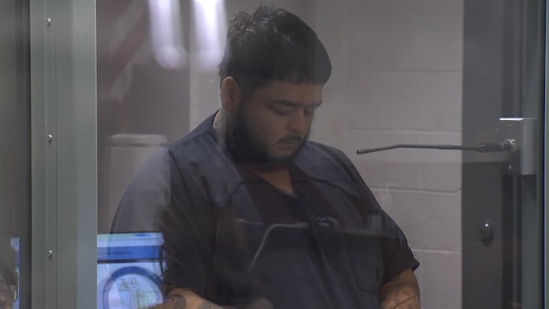 The man accused of killing a Las Vegas mother and her two children appears in Las Vegas...