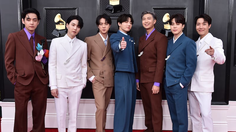 FILE - Korean group BTS appears at the 64th Annual Grammy Awards in Las Vegas on April 3,...