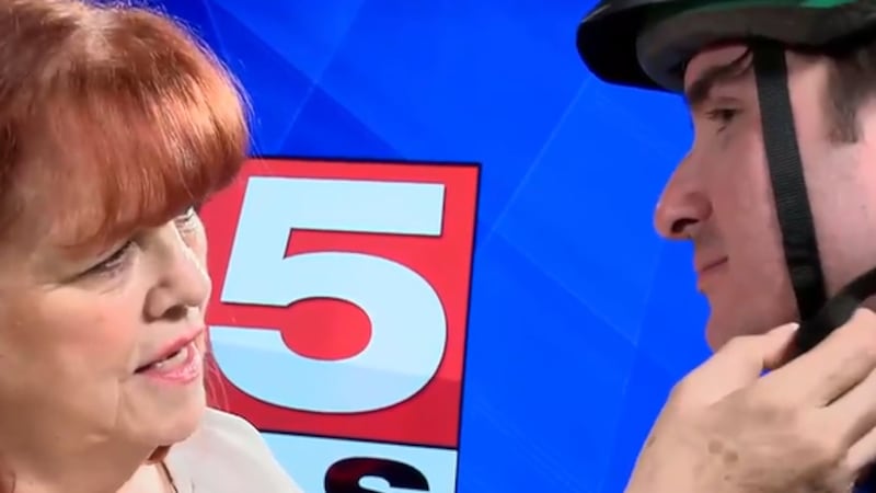 Erin Breen, director of PedSafe Vegas, showed simple ways to make sure a helmet is fitted...